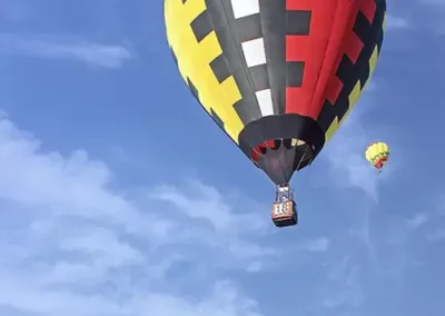 Image of balloons landing.